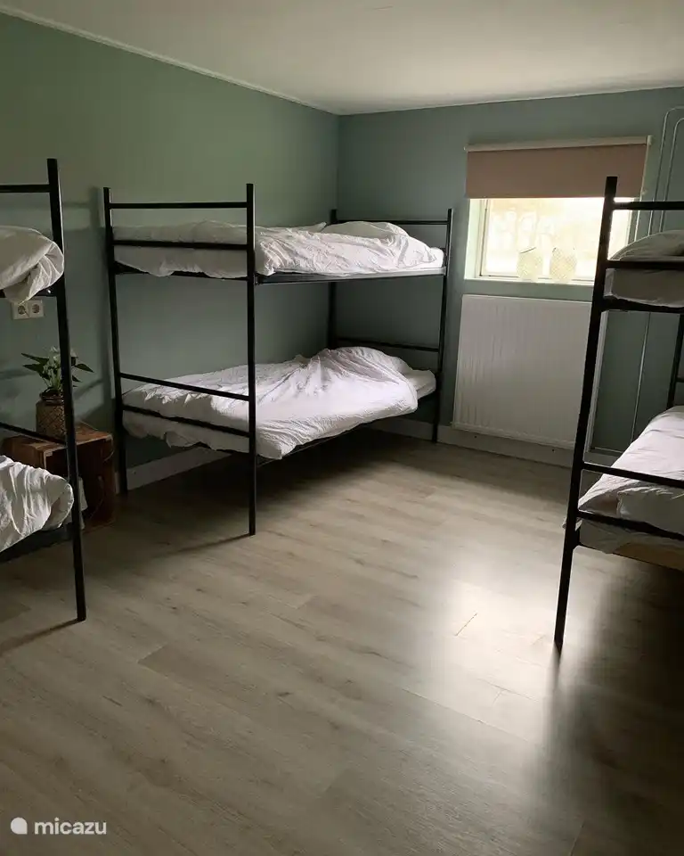 Bedroom with 3 bunk beds.