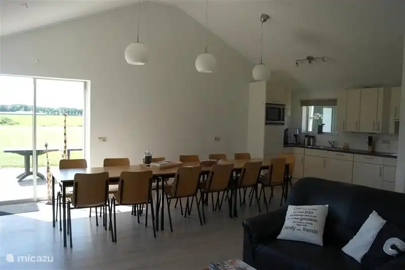 Plenty of room for tables and chairs and sliding doors giving access to the spacious terrace.