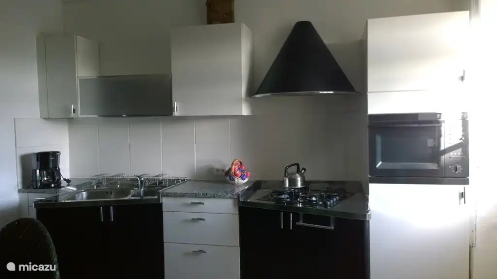 Woonkamer met open keuken Gite Bleu