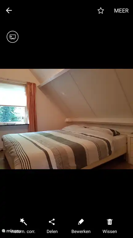 Schlafzimmer 1, mit einem großen Doppelbett