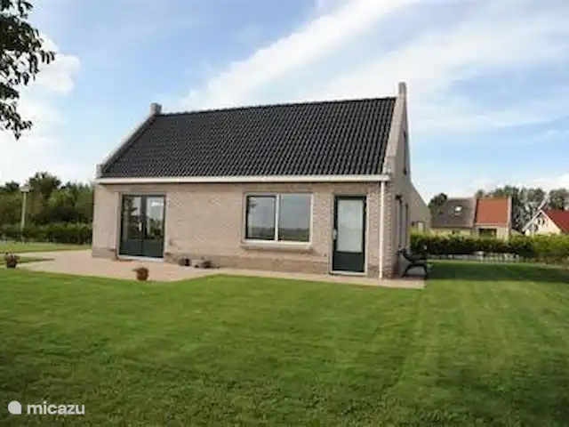 Stinswoning de Wadden en Países Bajos, Frise, Tzummarum - casa vacacional jardín