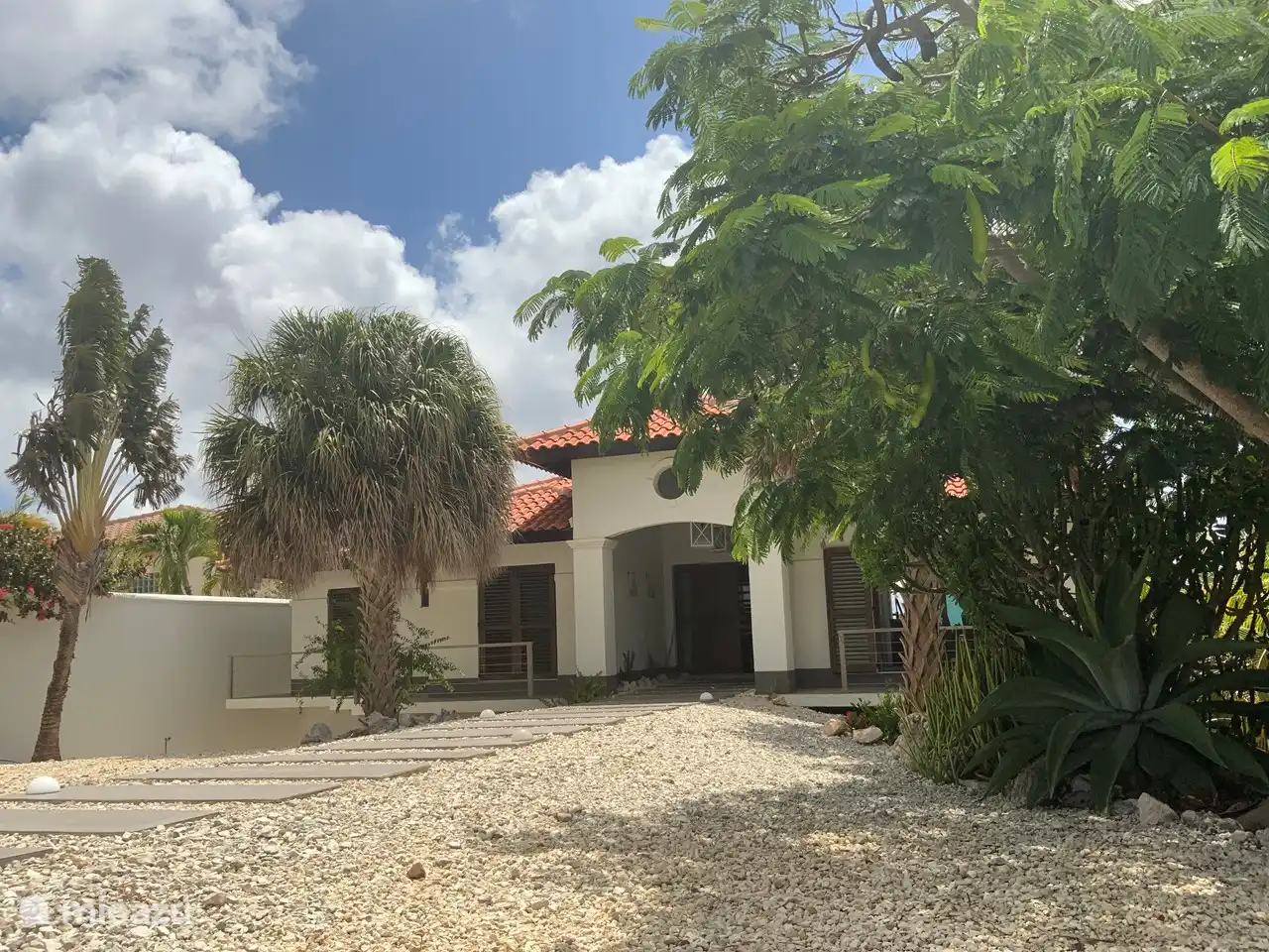 Resumen jardín delantero Villa @la brisa.