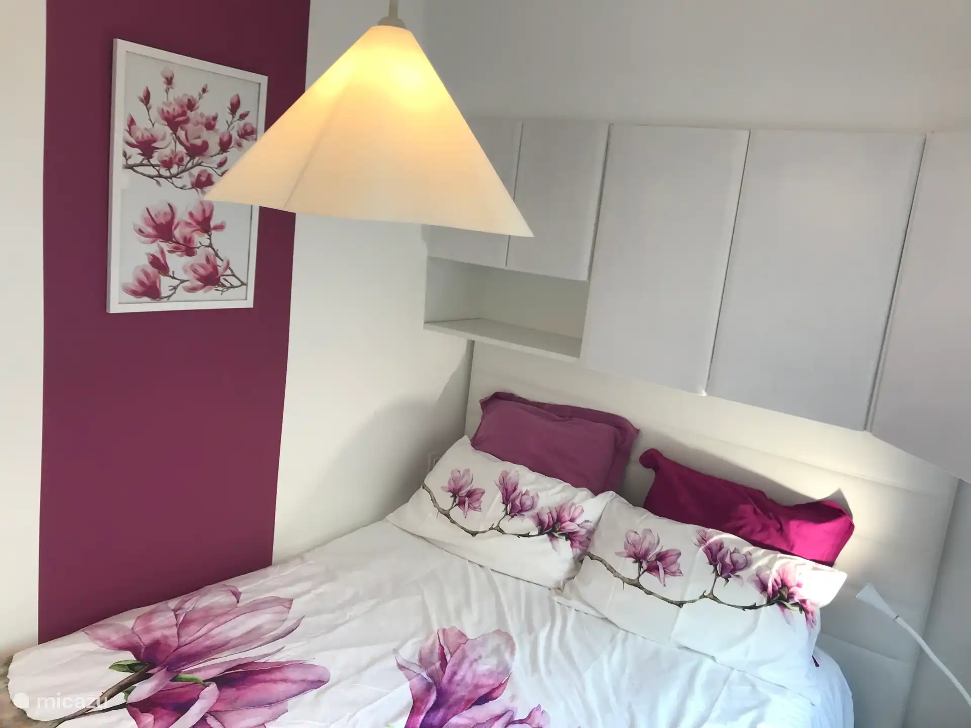 Schlafzimmer mit Doppelbett 
Ferienwohnung 103