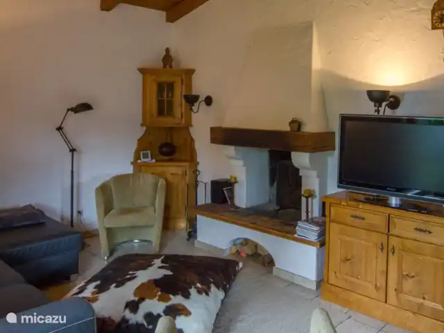 Maison Olthof | Autriche, Tyrol, Ellmau - chalet ...le salon avec grande cheminée, TV satellite et chaîne stéréo DVD...