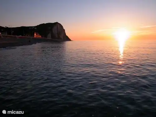 Zonsondergang aan het strand