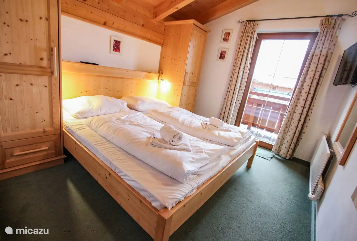 Slaapkamer met balkon