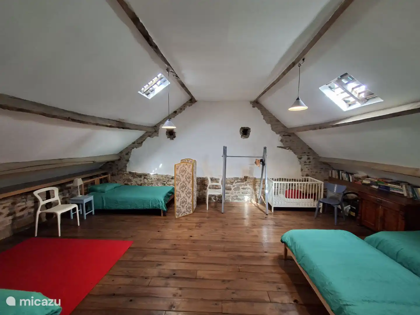 Slaapkamer met 4 bedden