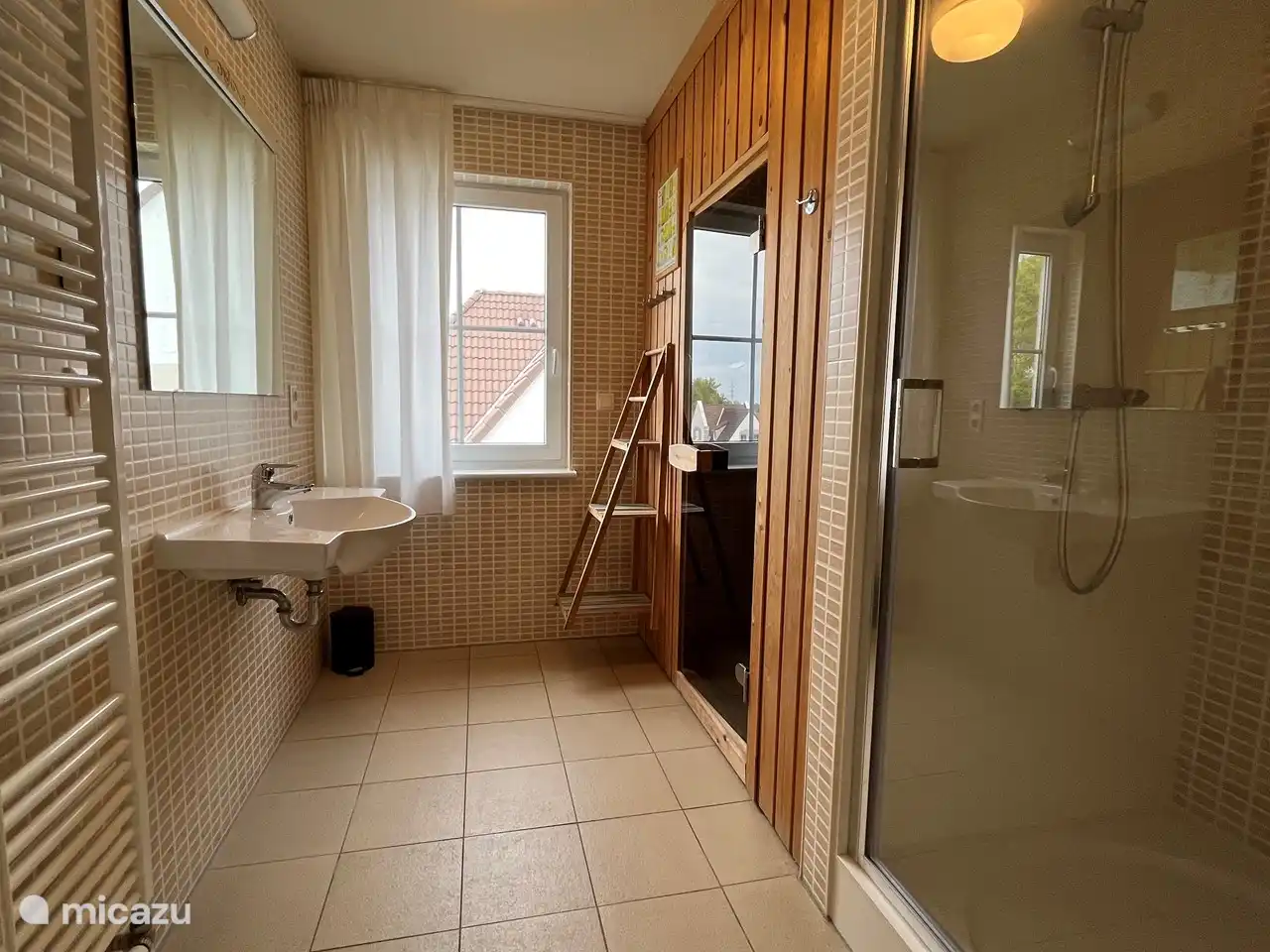 1st floor bathroom with large sink; sauna and shower