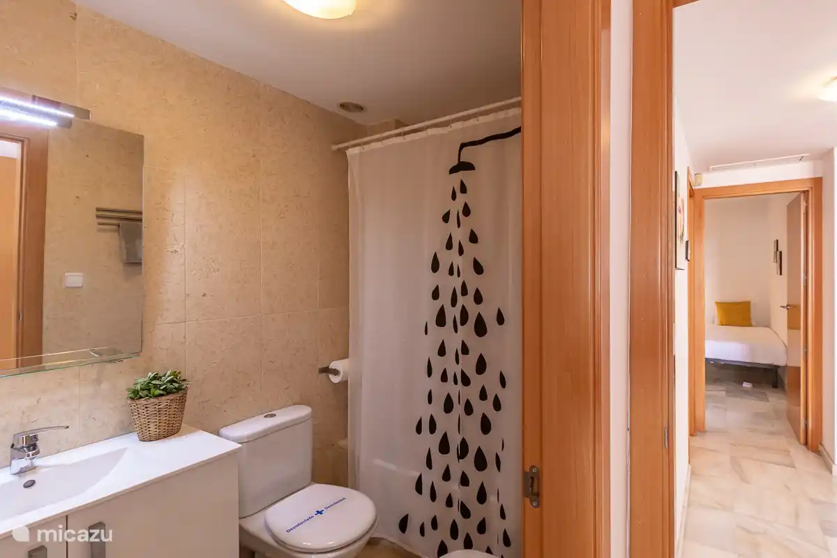 Ensuite bathroom with bath