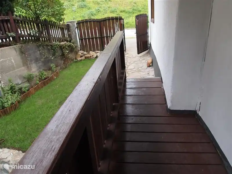 The sidewalk at the entrance.