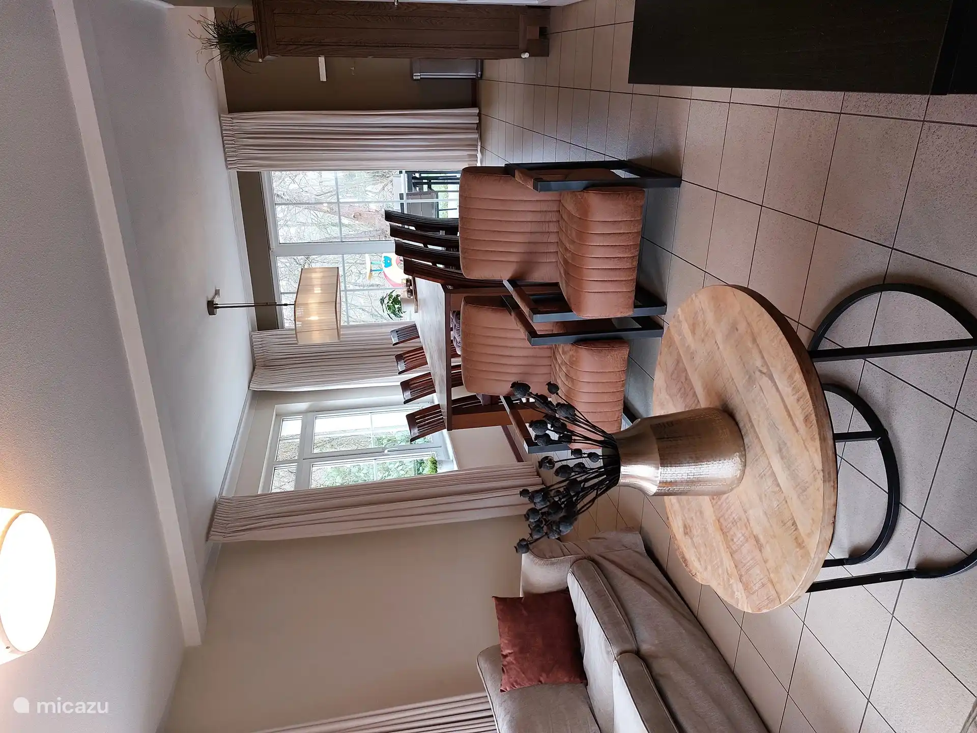 Spacious, cozy living room with flat screen TV