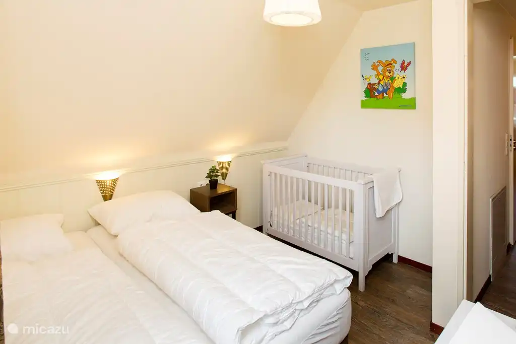 1st floor:
2 person bedroom with cot.
Changing table with changing mat.