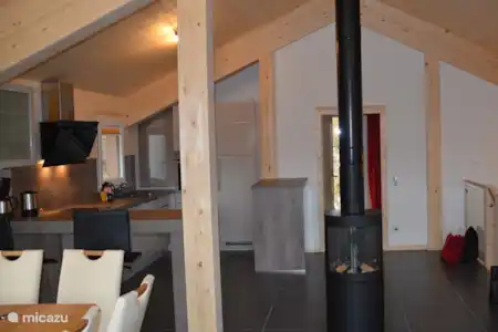 Vakantiehuis Oostenrijk, Karinthië, Turracher Höhe chalet Der Weisse Hirsch gashaard in de woonkamer