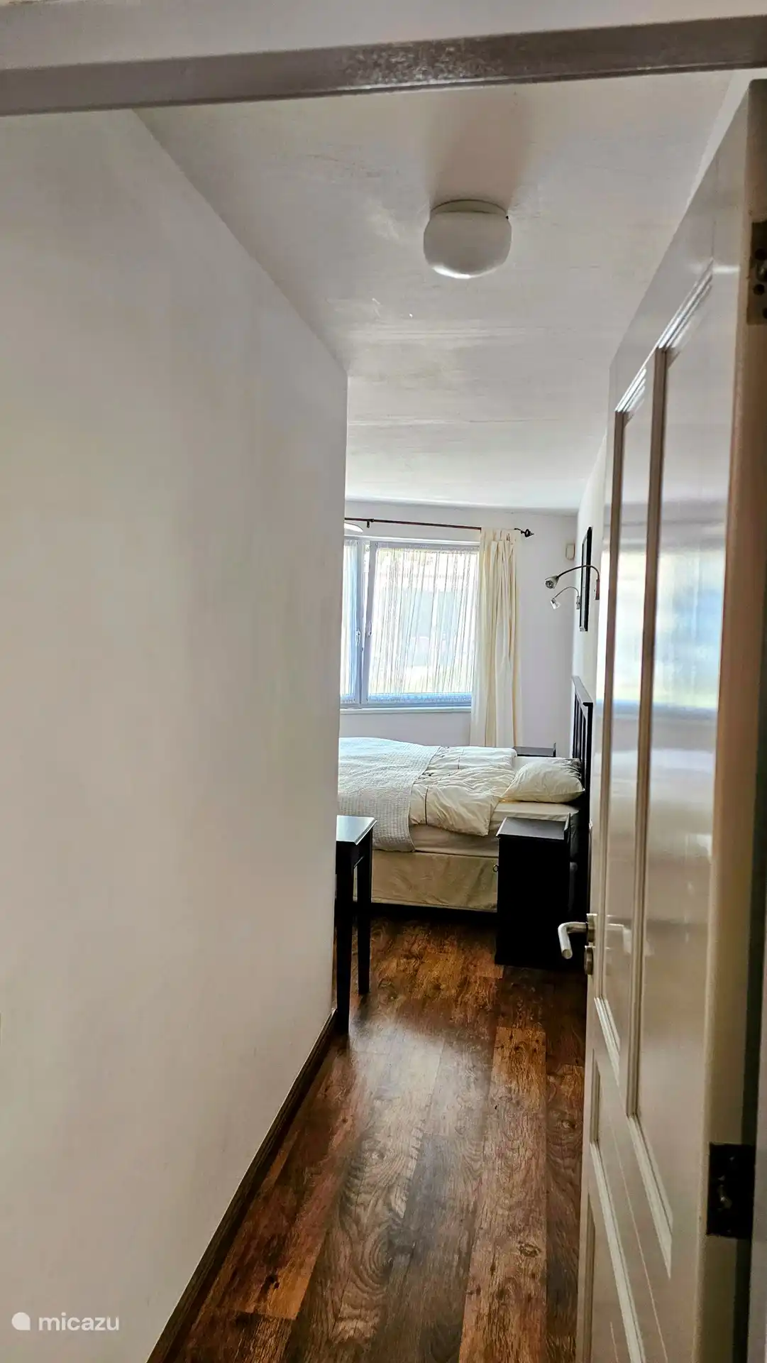 One of the bedrooms to the left of the house.