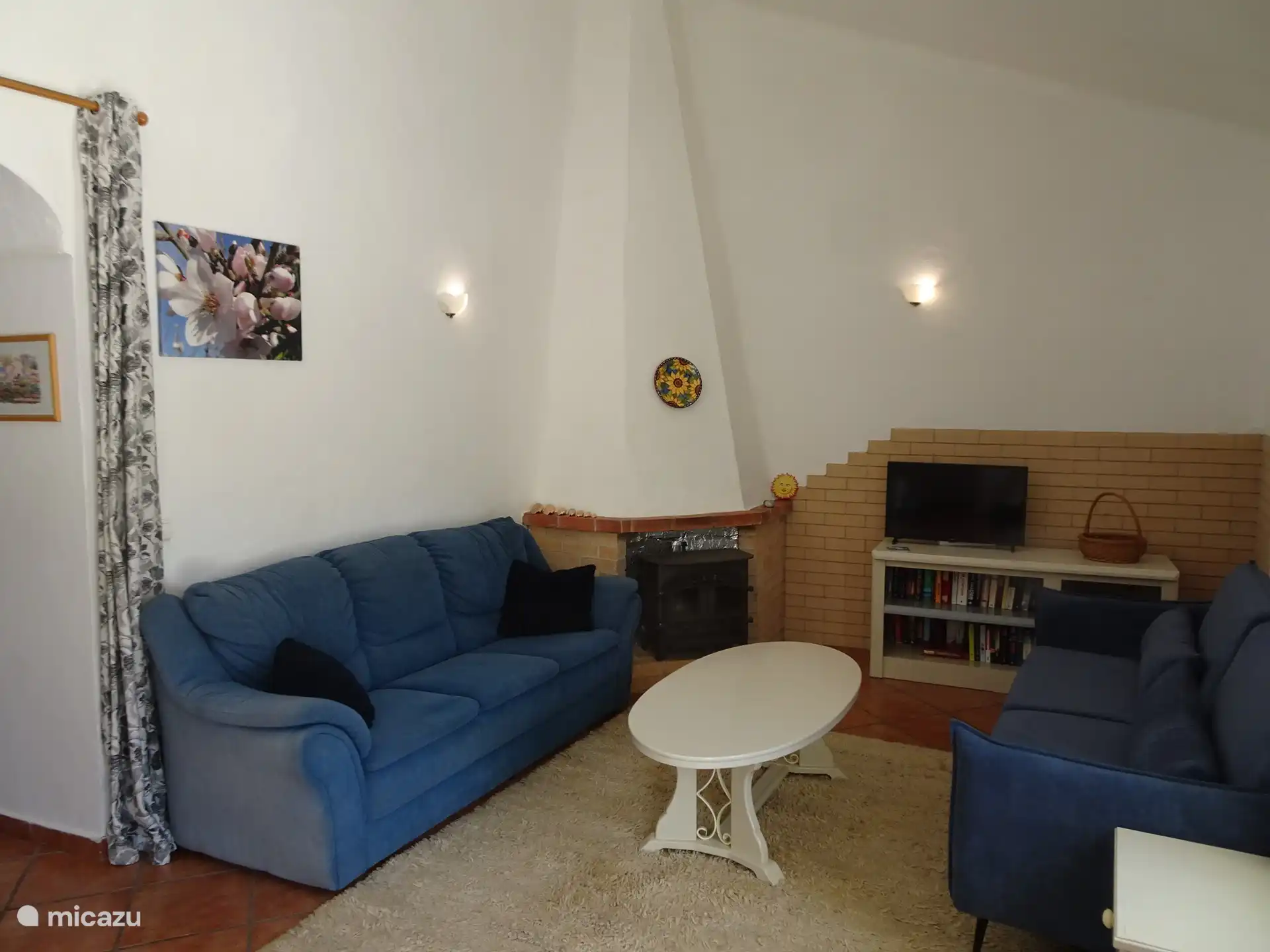 Wohnzimmer mit Holzofen