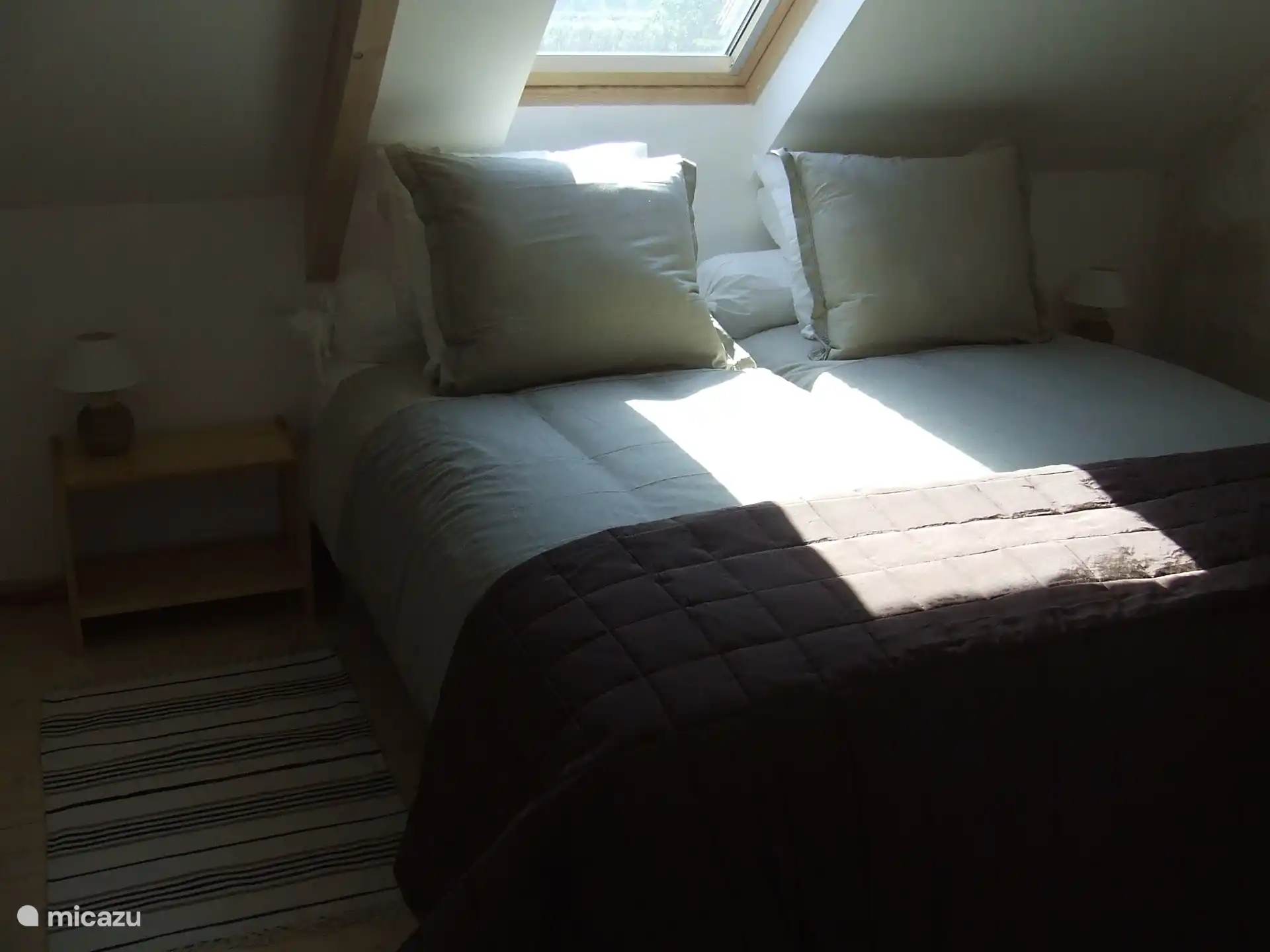 The first bedroom with 2 box spring beds