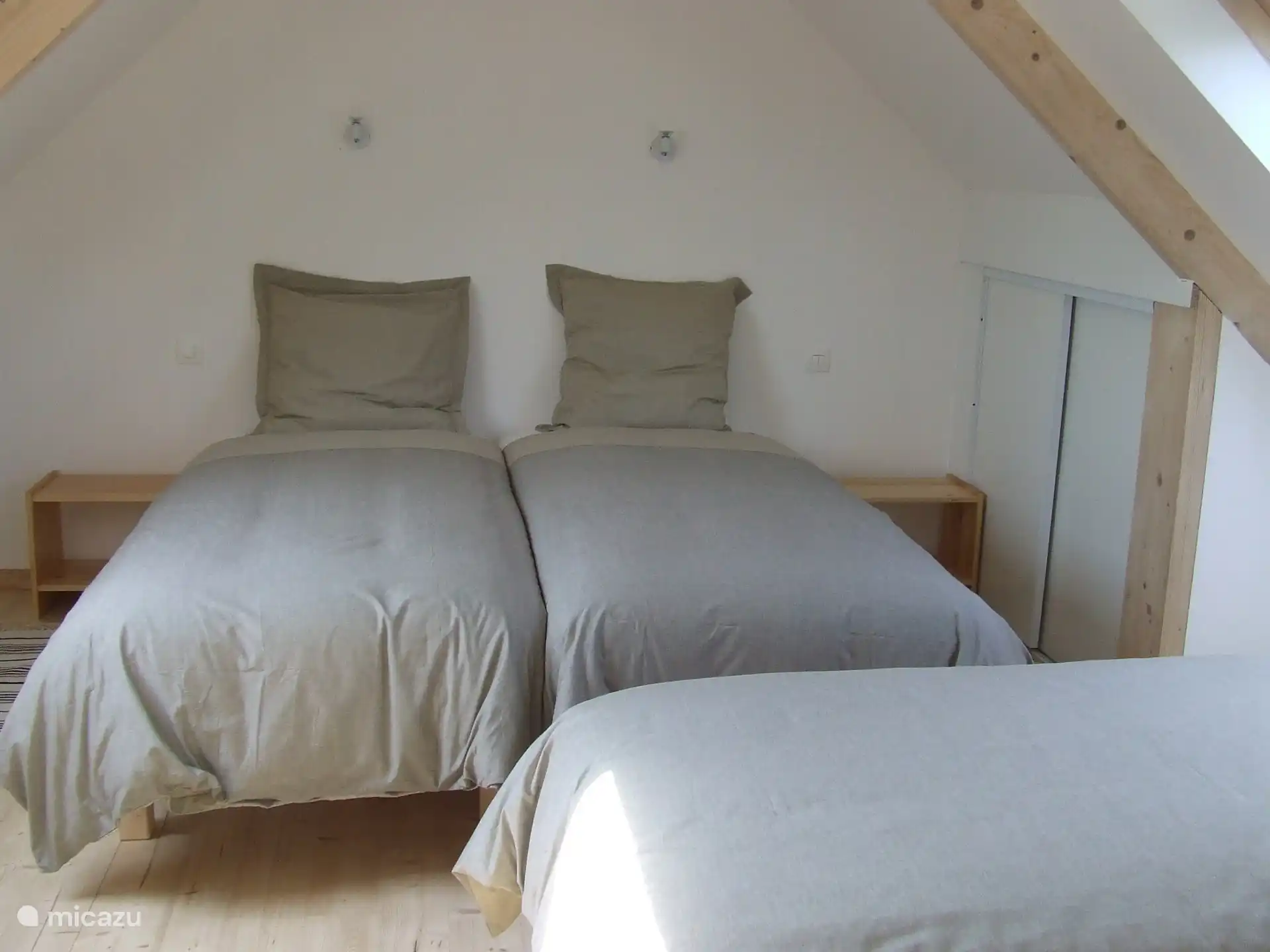 The second bedroom with 4 box spring beds