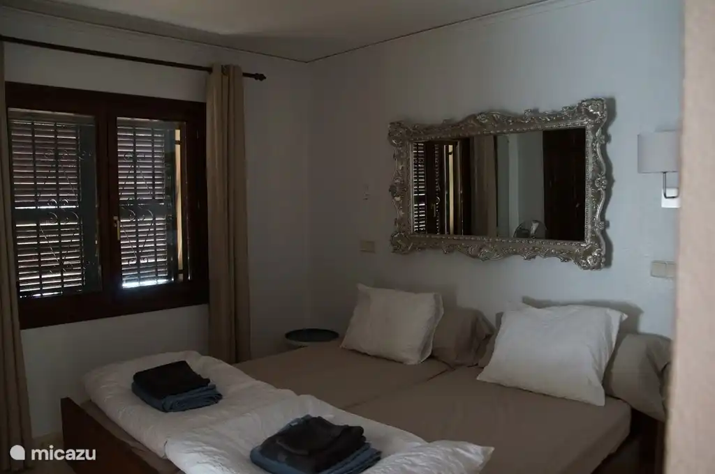 1 bedroom with ensuite bathroom. Easy shutters for an extra dark bedroom.