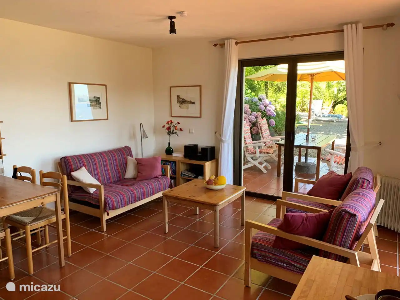 Sitting room with a view of the terrace and garden