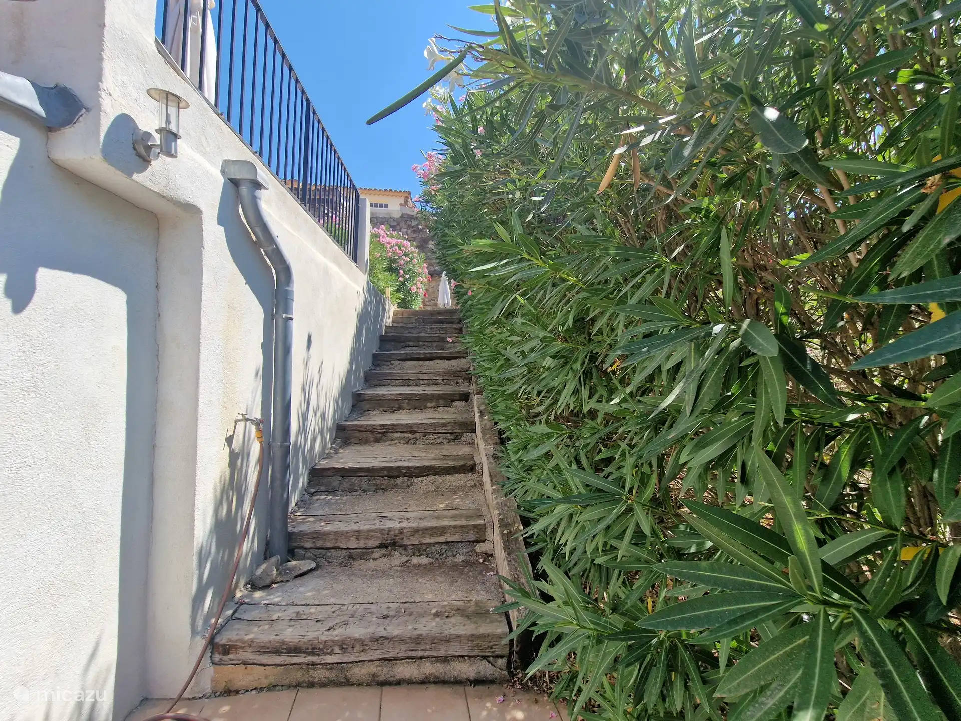 Stairs up from private terrace to the house