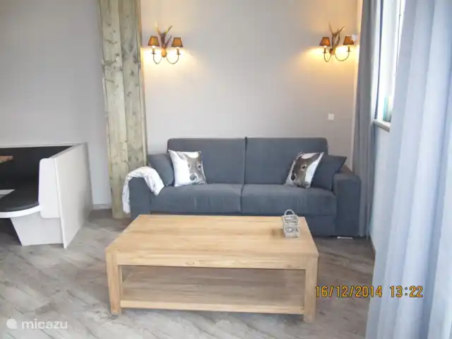 Aineckblick TOP 15 | Autriche, Salzburgerland, Sankt Margarethen im Lungau - maison de vacances Coin salon avec luxueux canapé 4 places. Ce canapé peut être déplié en canapé-lit avec un luxueux matelas séparé.