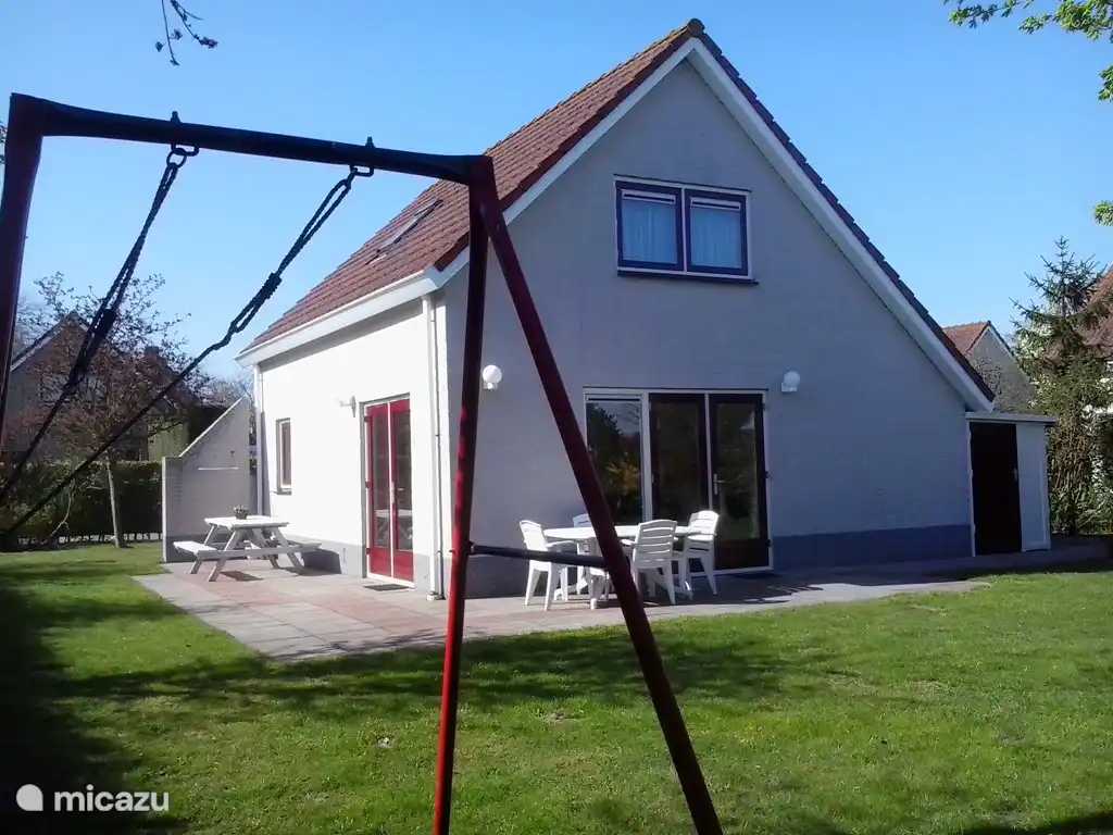 Backyard with swing.