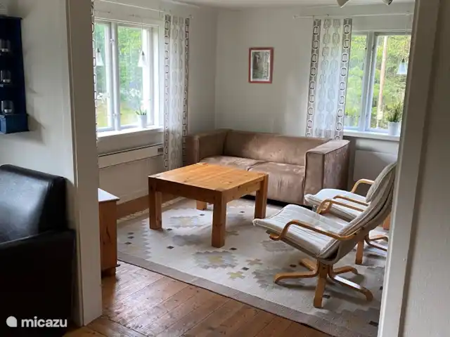 vakantiehuis huren in Zweden, Småland, Vägla (tussen Markaryd en Hallaryd) – Ellefors woonkamer en zithoek met TV