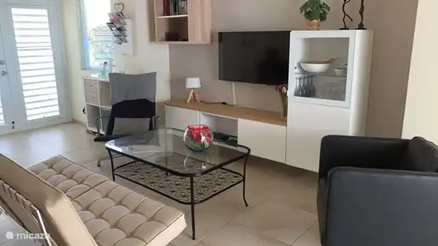 Sitting area with smart TV and air conditioning