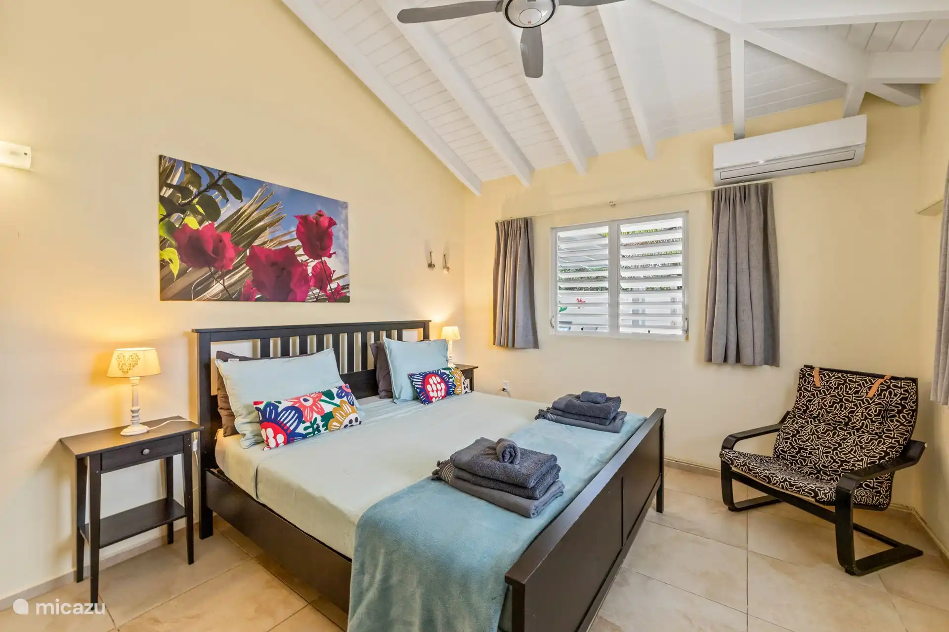 Spacious master bedroom with air conditioning 