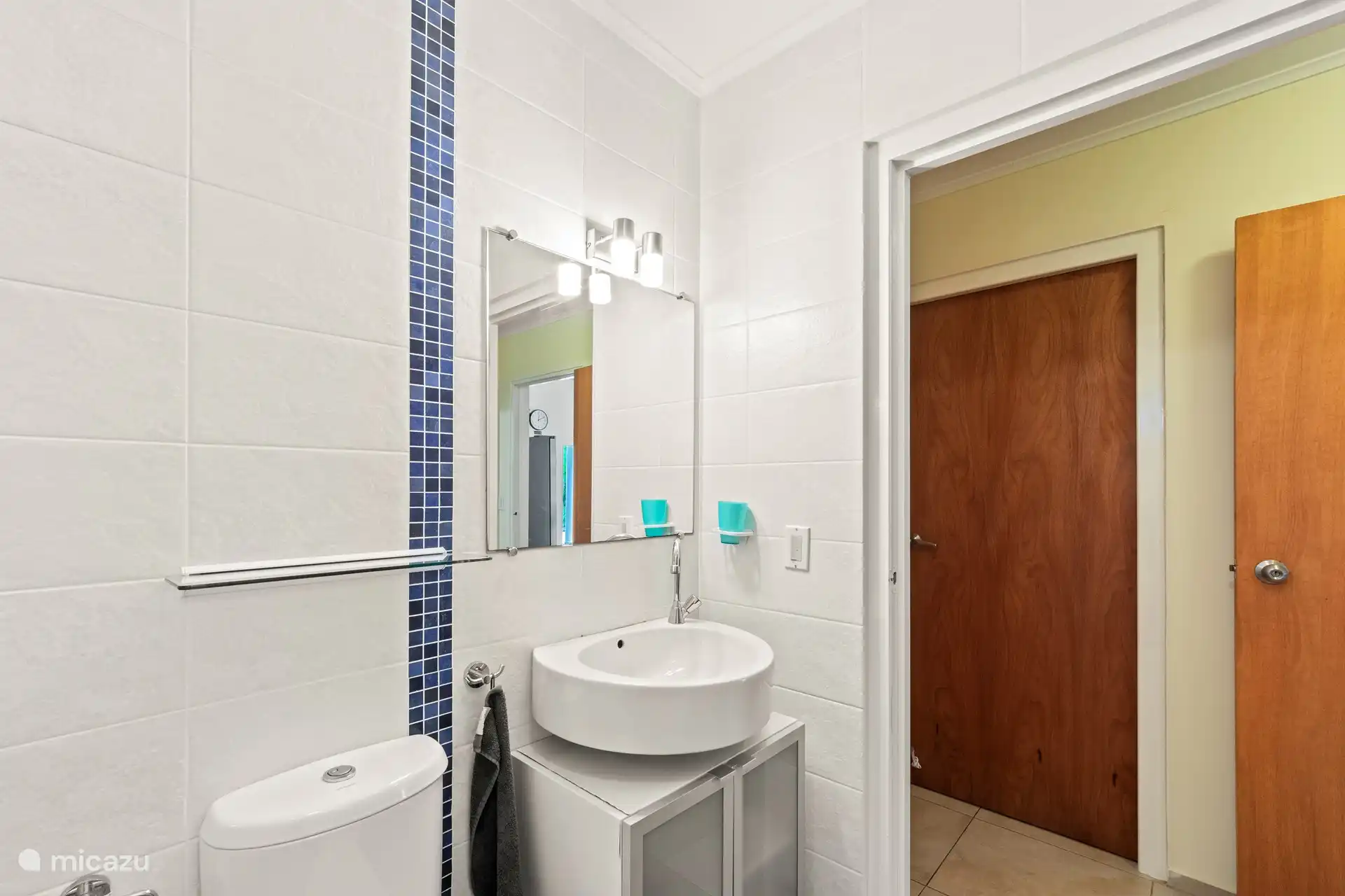 Bathroom 2 with spacious shower, sink and toilet