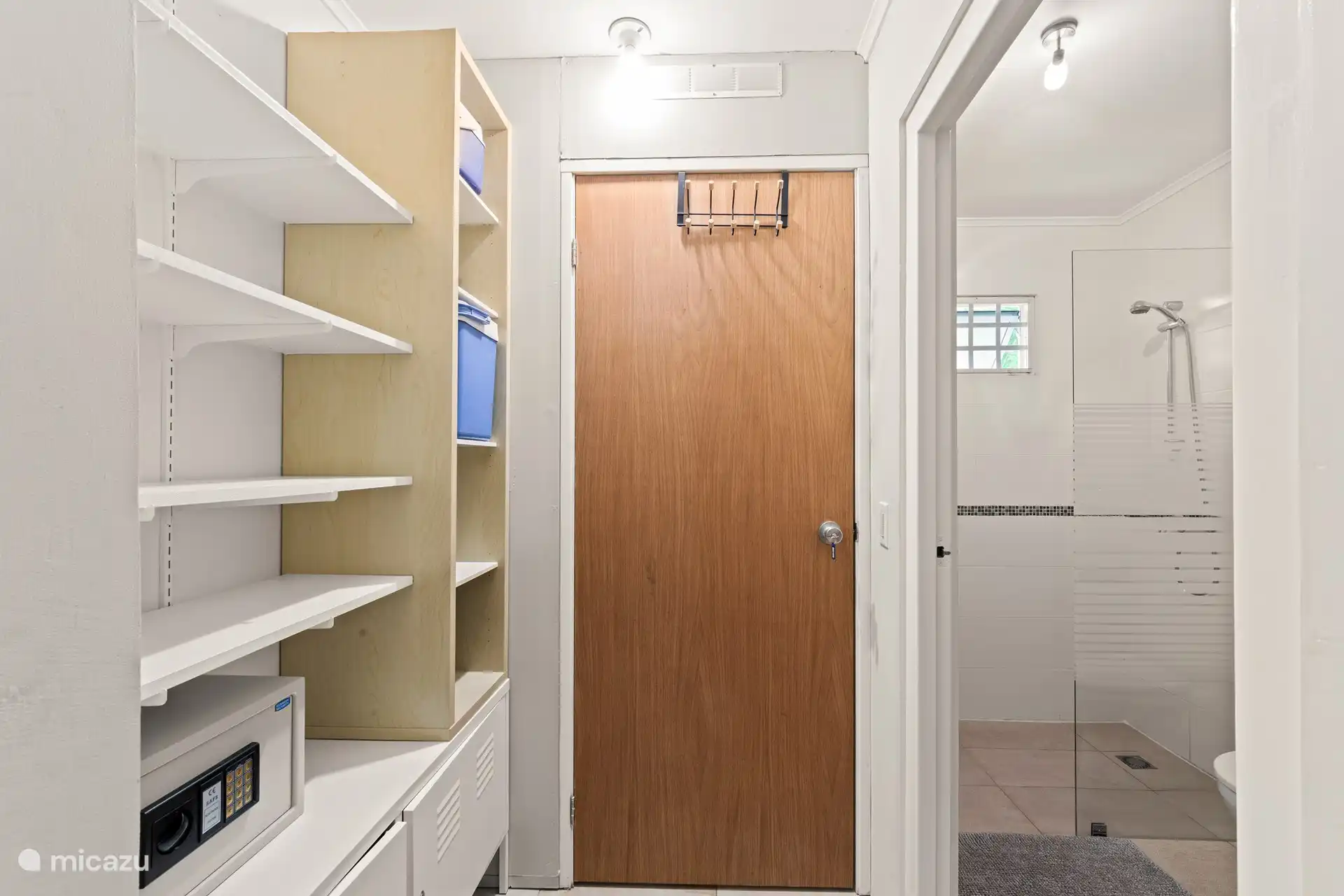 Hall with security safe and storage space