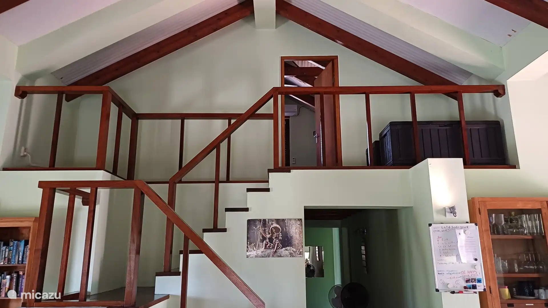 Front view stairs to the attic with bedroom.