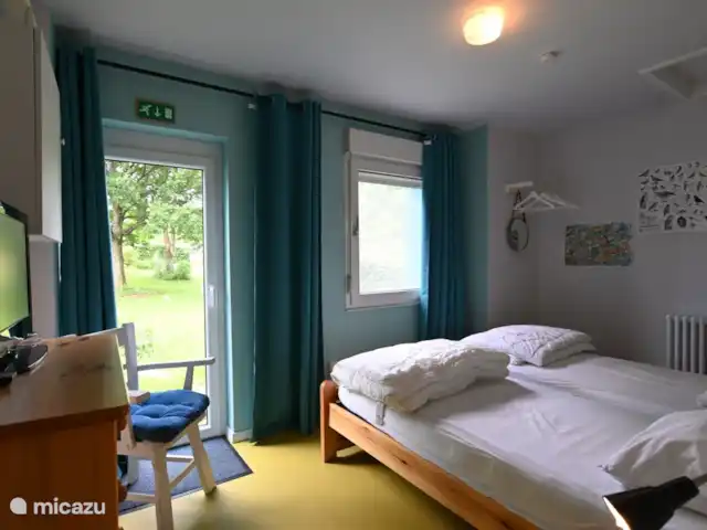Osterglocken, maison de vacances Eifel | Belgique, Ardennes, Butgenbach - maison de vacances Chambre Nadia : 2ème chambre au rez-de-chaussée avec vue sur le jardin