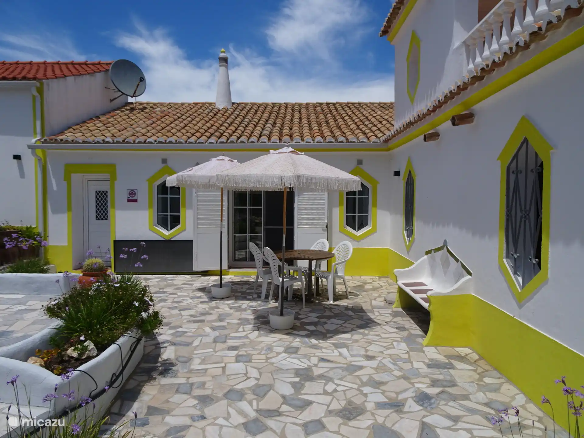 Sunny terrace in front of the Cottage