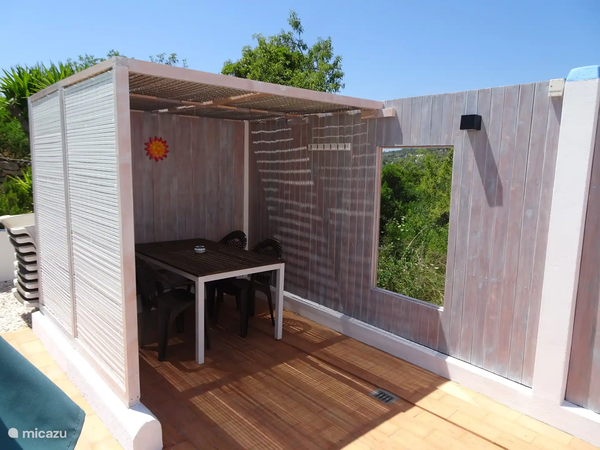 Summer 2024 extended and closed pergola where you can sit sheltered