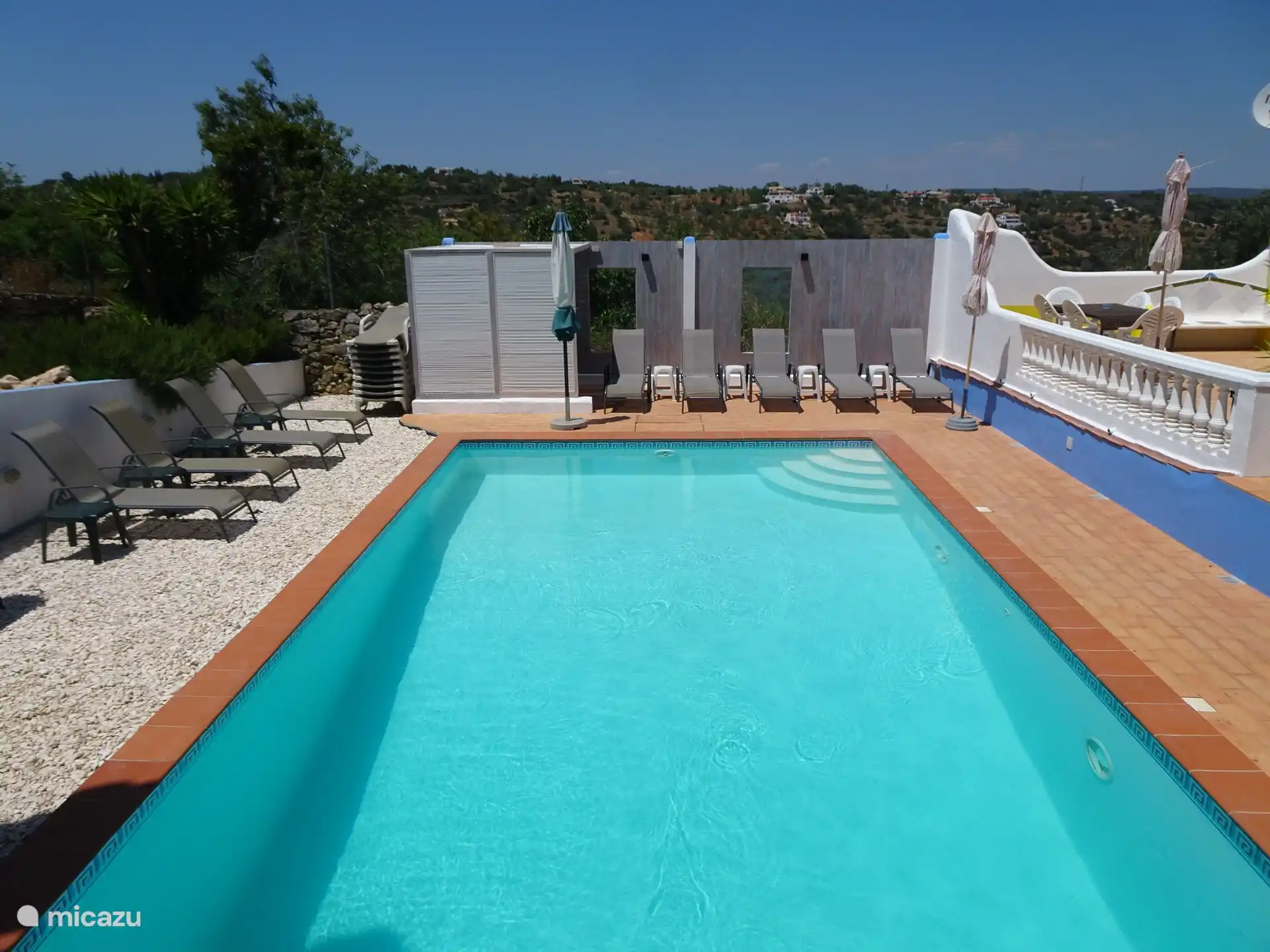 Swimming pool with terraces