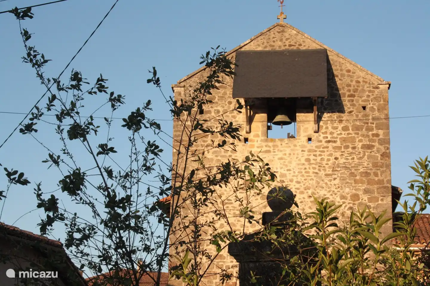 At the front of the domain is the small church of our village.