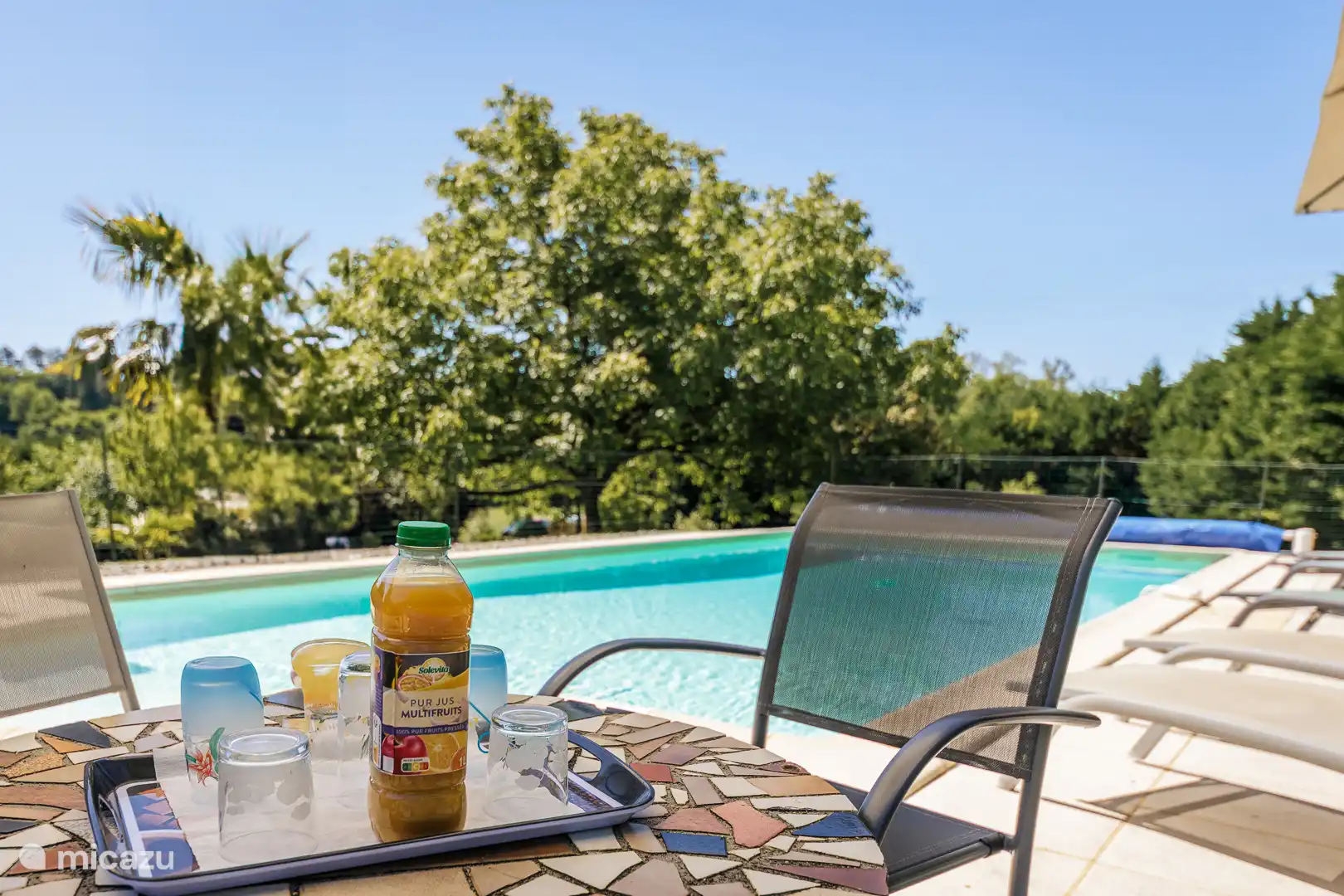 Relaxing by the pool