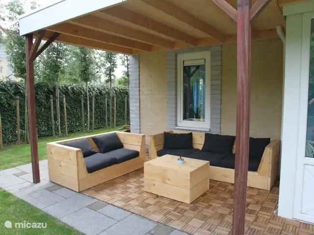 Maison zélandaise au bord de la mer | Pays-Bas, Zélande, Kamperland - maison de vacances Auvent avec canapés de salon et cheminée