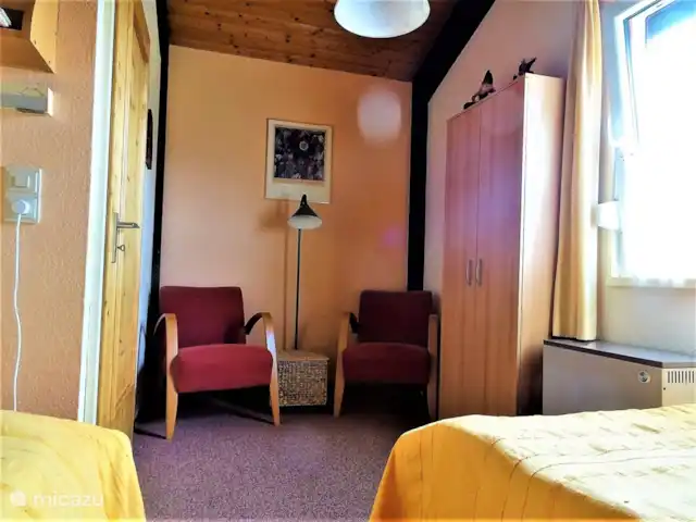 vakantiehuis huren in Duitsland, Beieren, Lichtenberg (Opper-franken)  – Vakantiehuis 'Fuchswechsel' Slaapkamer met zithoek