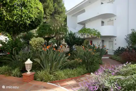 Vakantiehuis Spanje, Costa del Sol, Mijas Costa appartement Modern apartment met fraai zeezicht Tuin