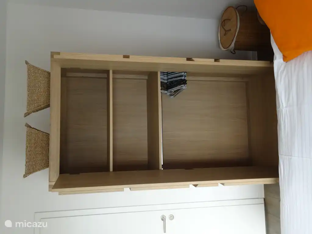 The spacious wardrobe and wardrobe in the bedroom