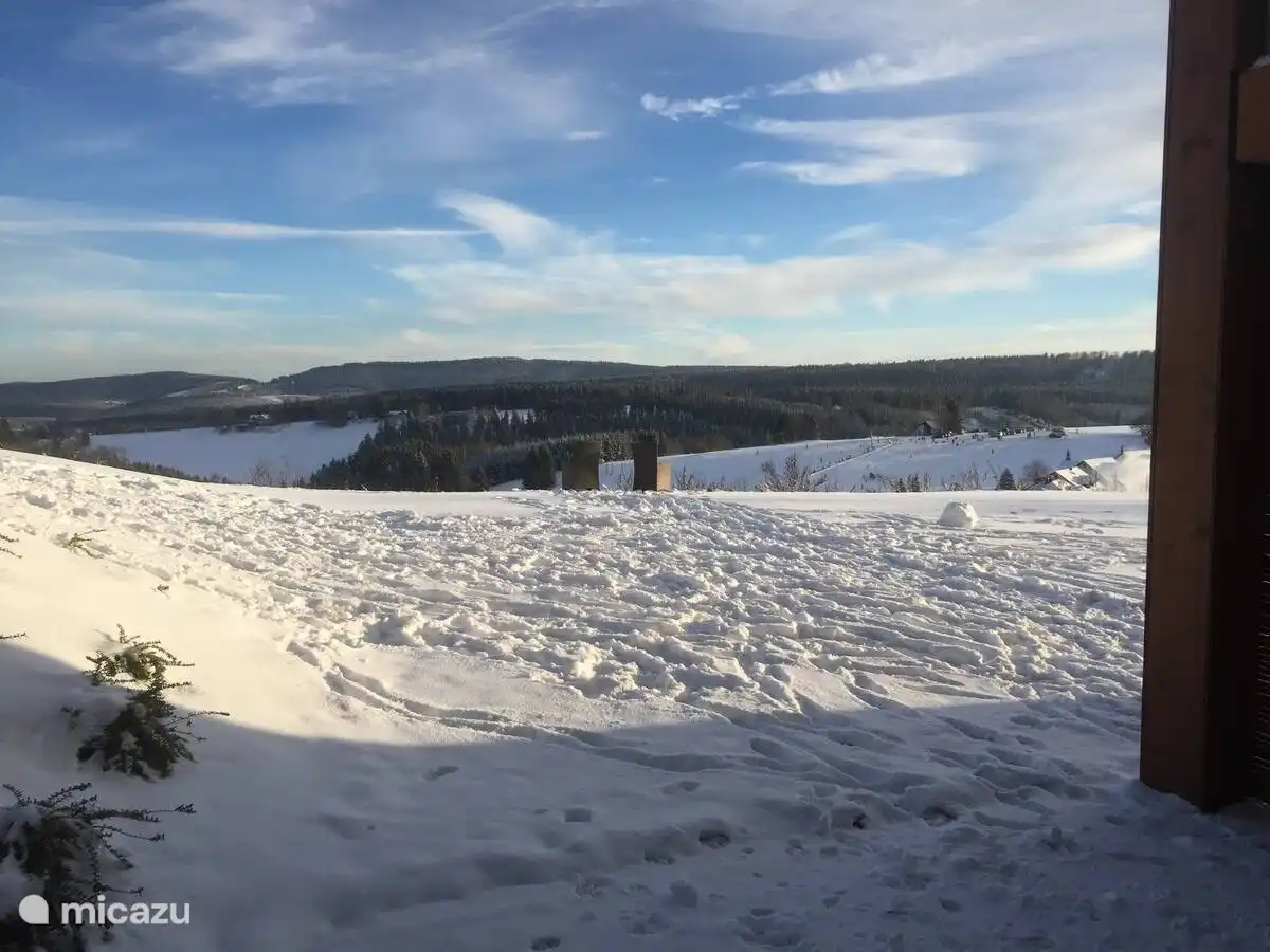 Ski from the living room through the backyard directly onto the slopes! Seats placed all the way in the front for a beautiful view over the slopes.