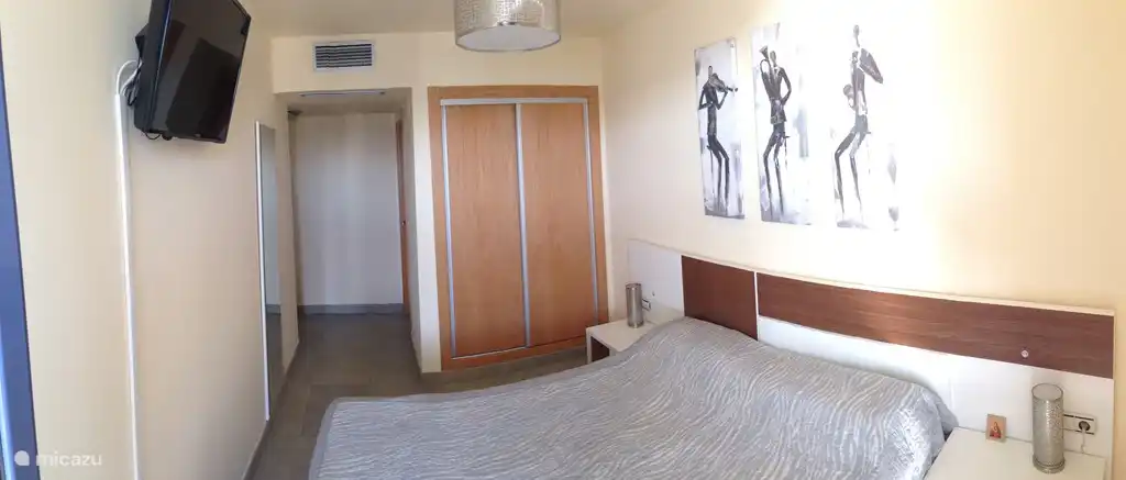 The master bedroom with TV.