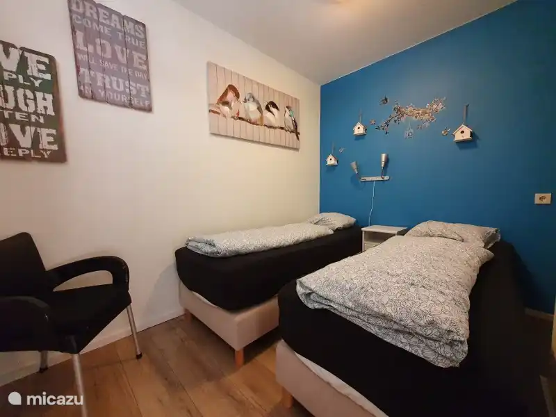 Bedroom with 2 box spring beds