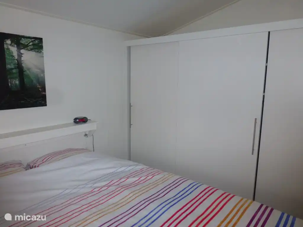 Bedroom (1) with wardrobe.

