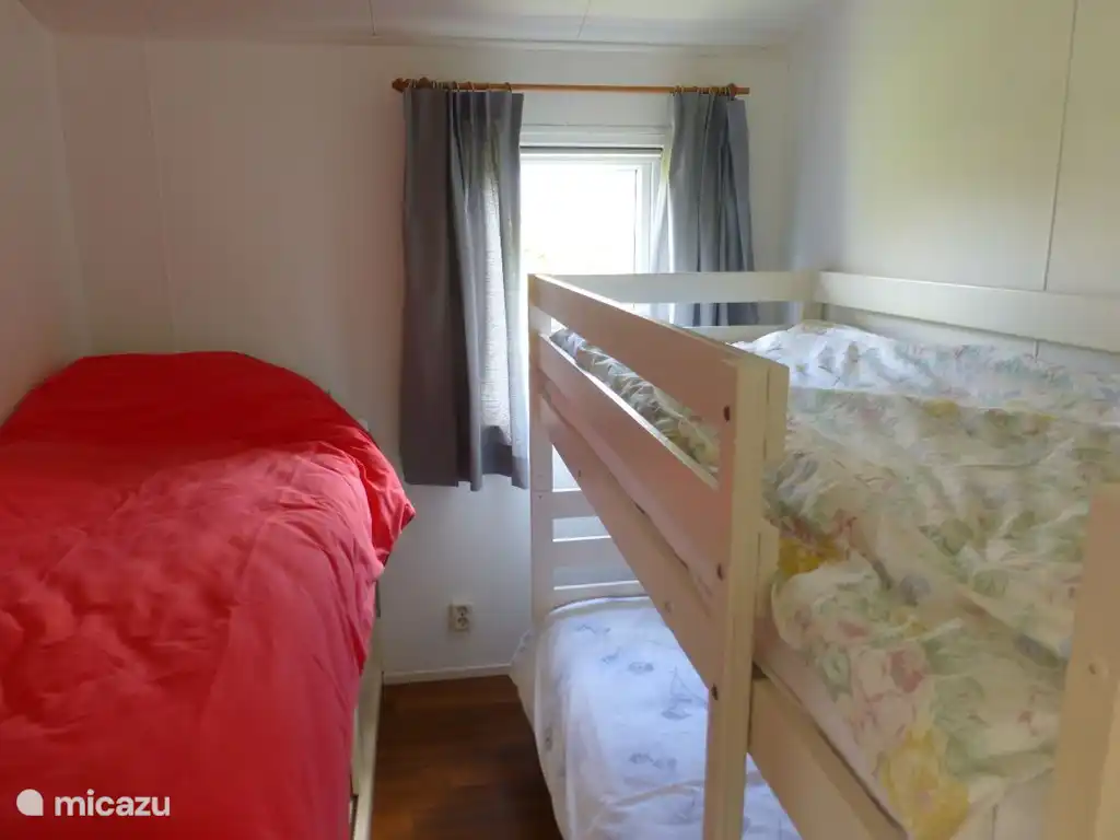 Bedroom (2) with bed and bunk bed.
