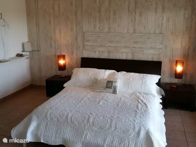 Lujosa villa con piscina privada en Aruba, Norte, Noord - villa Recámara principal con vista al jardín