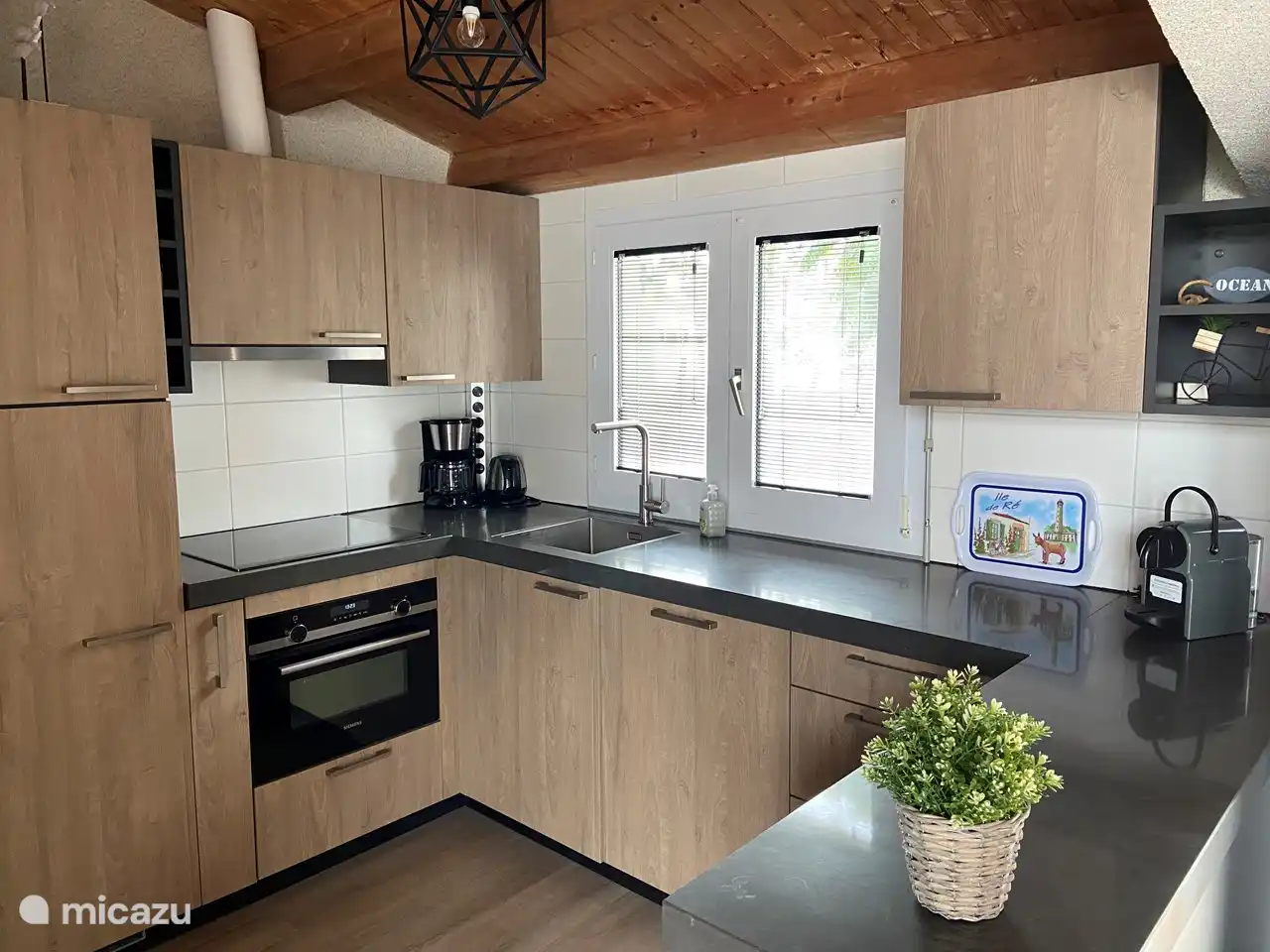 New design kitchen with dishwasher and combi oven.