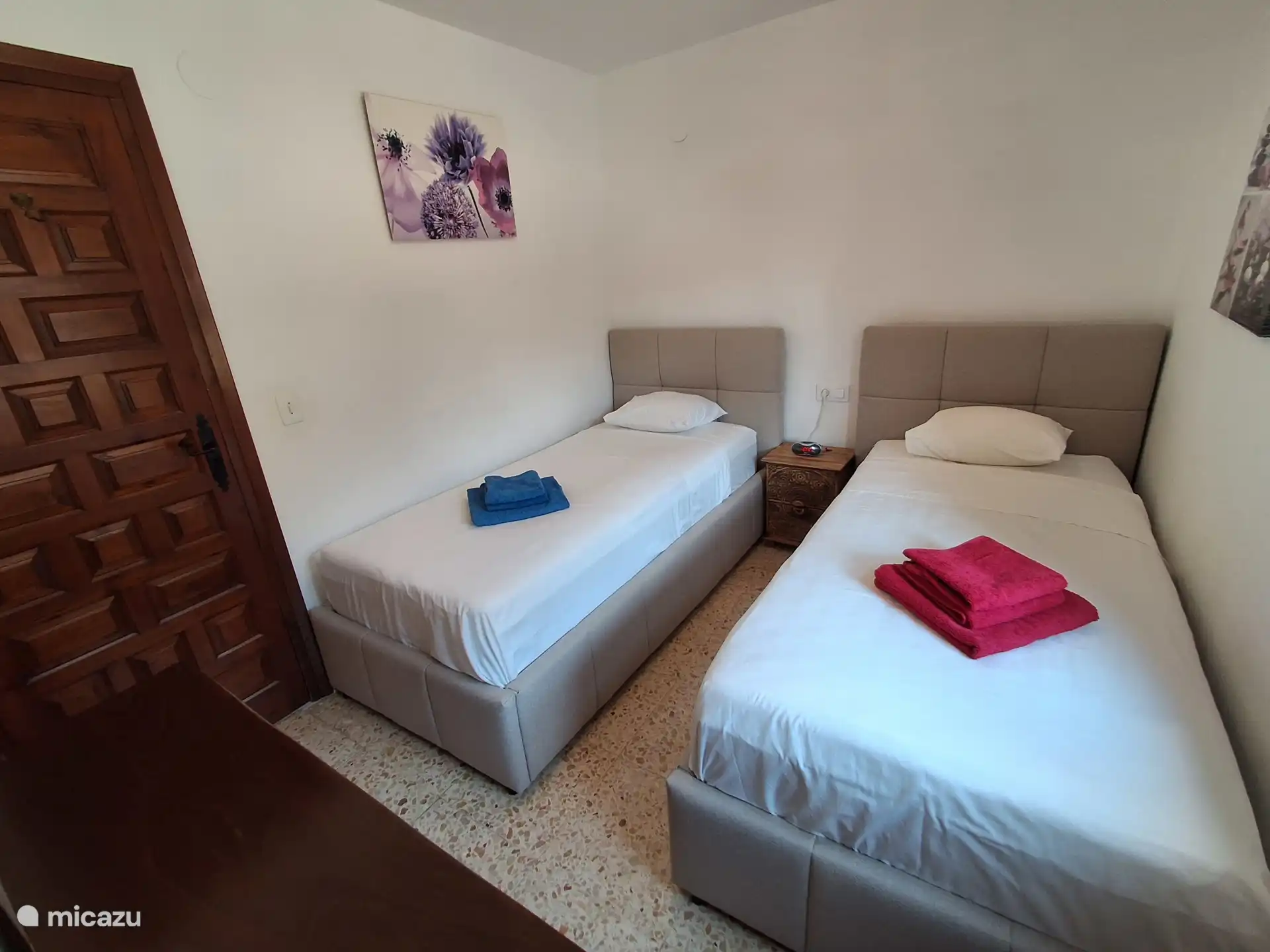Beneden slaapkamer met eenpersoonsbedden